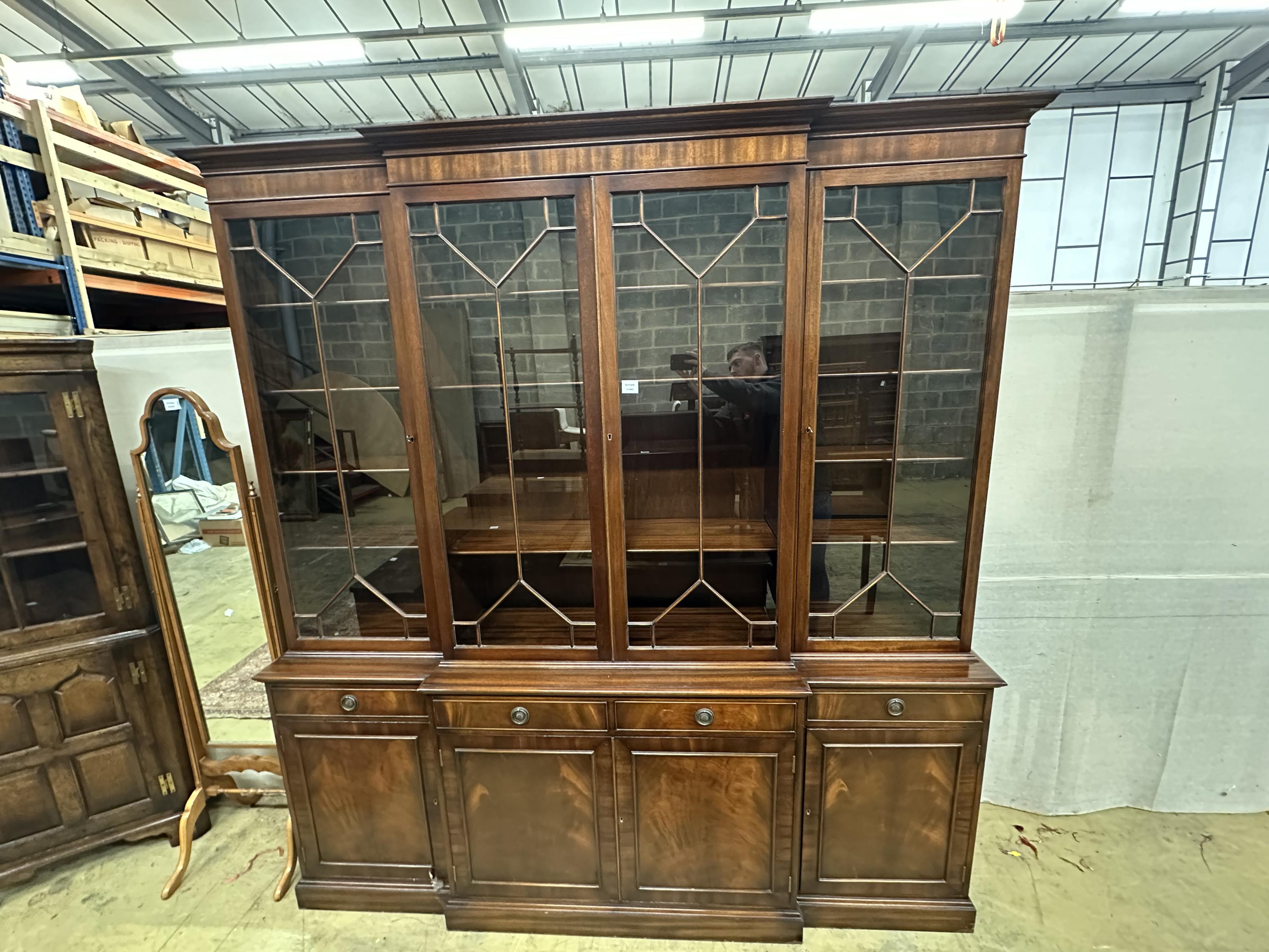 A reproduction George III style mahogany breakfront library bookcase, width 204cm, depth 48cm, height 220cm. Condition - good